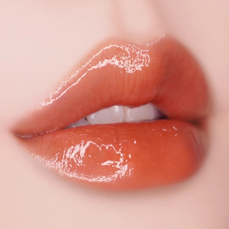 Unleashia - Sisua Popcorn Syrup Lip Plumper - hydratační lesk na rty - č. 4 Honey Grapefruit - 3,8 g